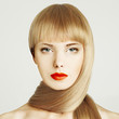 Blond hair. Beautiful woman face with make-up