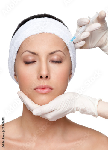 Photo: Botox upper lids correction, isolated, white background Botox upper lids correction, isolated, white background