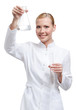 Lady doctor hands measuring cylinder and conical flask