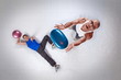 overhead view of two white men throwing balls