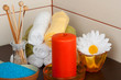 Foto: Spa still life with essential oil,candle and towel Spa still life with essential oil,candle and towel