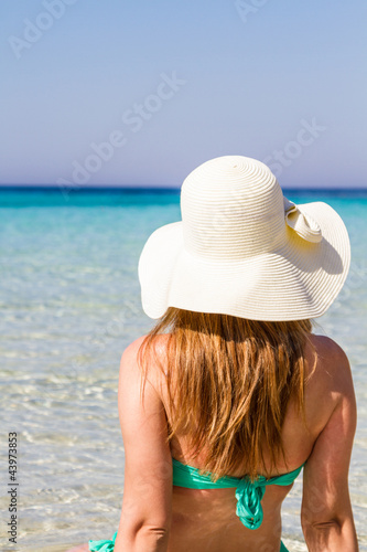 Photo: Young woman at beach Young woman at beach