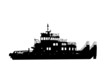 Silhouette of a sea towboat