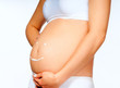 Foto: pregnant young female with cosmetic cream pregnant young female with cosmetic cream