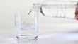 Video: Glass pouring with gas water over white Glass pouring with gas water over white