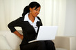 Young businesswoman with back pain