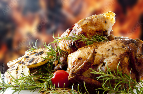 Photo: Barbecued chicken legs with rosemary and tomato Barbecued chicken legs with rosemary and tomato