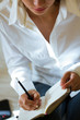 Photo: Woman writting hand with pencil Woman writting hand with pencil