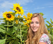 Bautiful woman with sunflowers