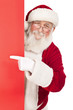 Photo: Santa pointing in red sing Santa pointing in red sing
