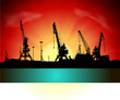 Silhouettes of port constructions on sunset