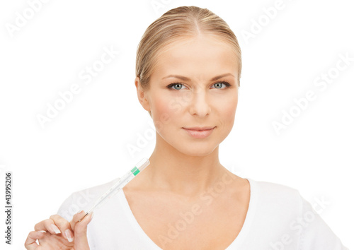Photo: female doctor with thermometer female doctor with thermometer