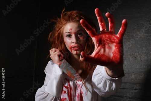 Photo: Horror Themed Image With Bleeding Freightened Woman Horror Themed Image With Bleeding Freightened Woman