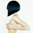 Nude woman with short hairstyle