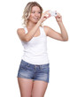 Girl posing for a photograph taken from his cell phone