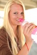portrait of young woman drinking water