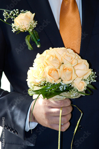 Photo: groom with a bouquet groom with a bouquet