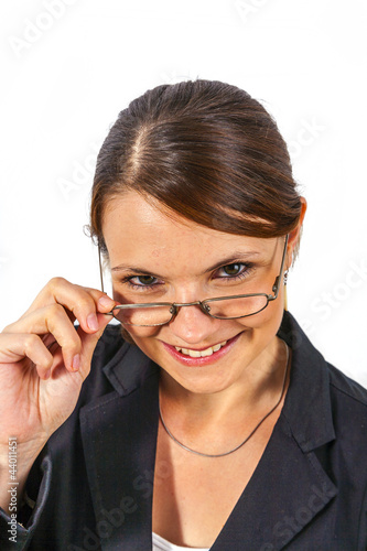 Photo: Close-up young beautiful woman with reading glasses Close-up young beautiful woman with reading glasses