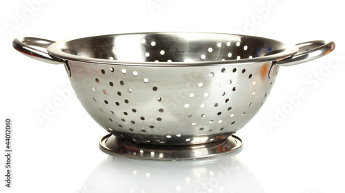 Photo: empty silver colander isolated on white empty silver colander isolated on white