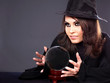 Woman with crystal ball.