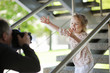 Father taking picture of smiling young girl