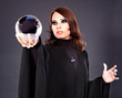Woman with crystal ball.