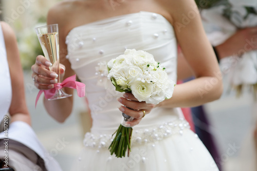 Photo: Bride holding a wedding bouquet Bride holding a wedding bouquet