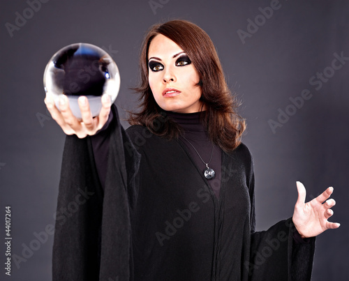 Photo: Woman with crystal ball. Woman with crystal ball.