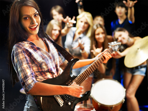 Photo: Band playing musical instrument. Band playing musical instrument.
