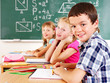 School child sitting in classroom.