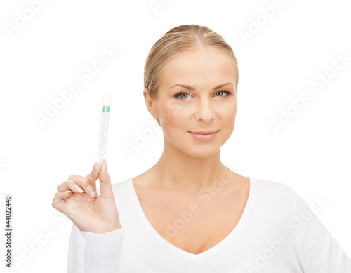 Photo: female doctor with thermometer female doctor with thermometer