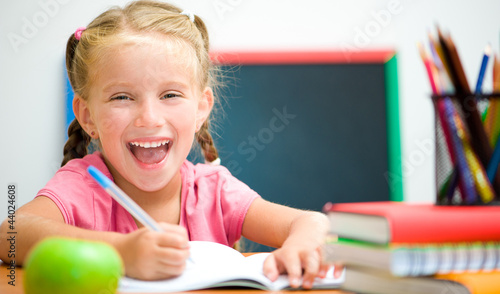 Photo: smiling girl at workplace smiling girl at workplace