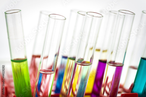 Photo: Group of laboratory test tubes with colored liquid inside Group of laboratory test tubes with colored liquid inside
