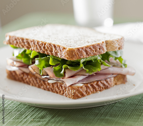 Photo: deli meat sandwich with ham, lettuce and mayo deli meat sandwich with ham, lettuce and mayo