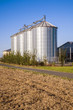 field in harvest with silo