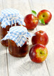 Apple jam and red apples