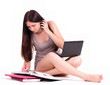 Beautiful student girl with computer PC and books