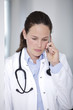 Young doctor on telephone