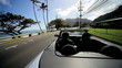 Open Top Cabriolet Driving Ocean Road