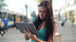 Video: Young woman with tablet computer in the city Young woman with tablet computer in the city