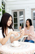Photo: Beautiful young business woman drinking tea. Portrait of asian. Beautiful young business woman drinking tea. Portrait of asian.