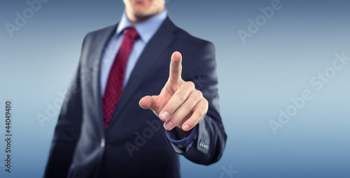 Foto: Man with Touchscreen Man with Touchscreen