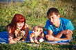 Photo: young family with a sun on the nature young family with a sun on the nature