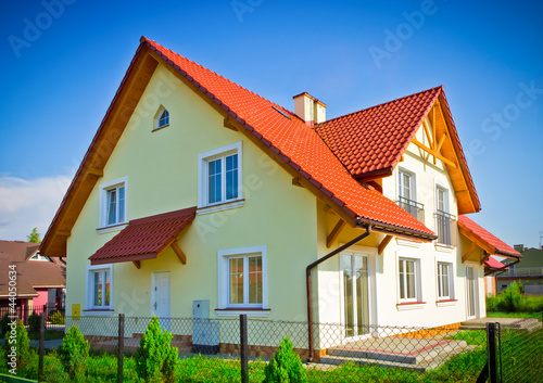 Photo: New build house at sunny sky day New build house at sunny sky day