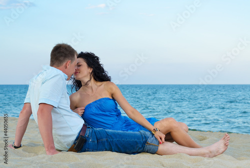 Photo: Couple kissing at the seaside Couple kissing at the seaside