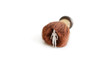 Figurine with a shaving brush over white background