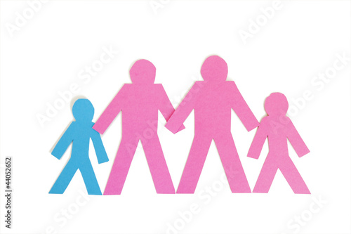 Photo: Row of paper stick figures holding hands over white background Row of paper stick figures holding hands over white background