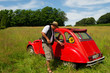 French man with his typical red car