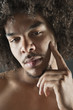 Portrait of young man with curly hair