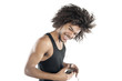 Portrait of a happy young man with mp3 player over white background